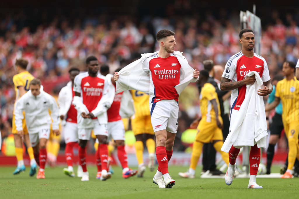 Declan Rice of Arsenal takeoff his jacket during the Premier League match between Arsenal FC and Brighton & Hove Albion FC at Emirates Stadium ...