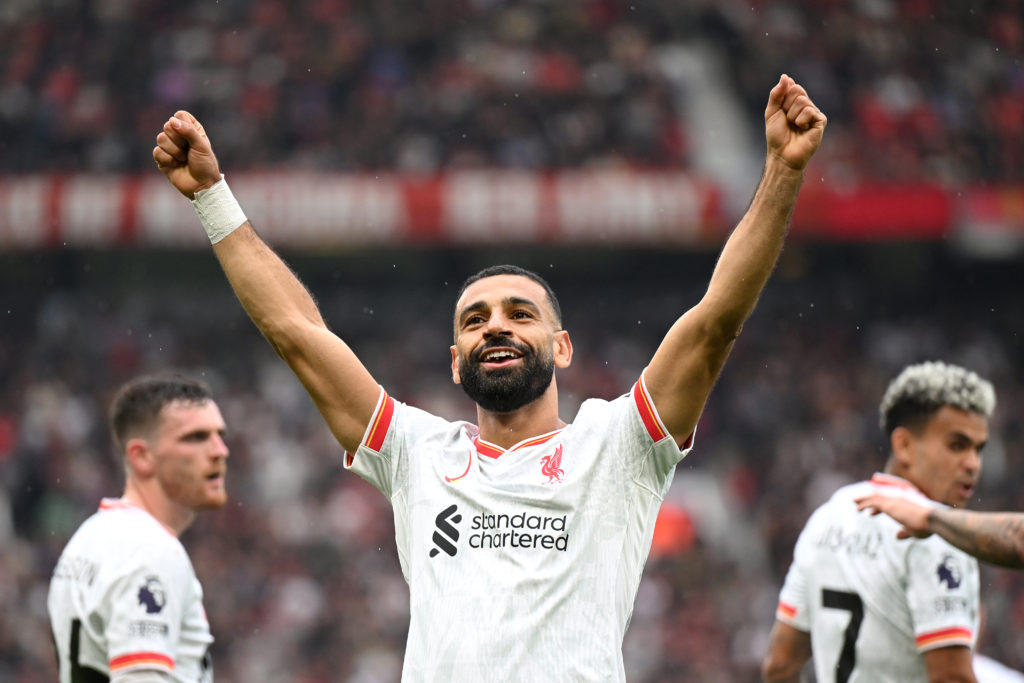 Mohamed Salah of Liverpool celebrates scoring his team's third goal during the Premier League match between Manchester United FC and Liverpool FC a...