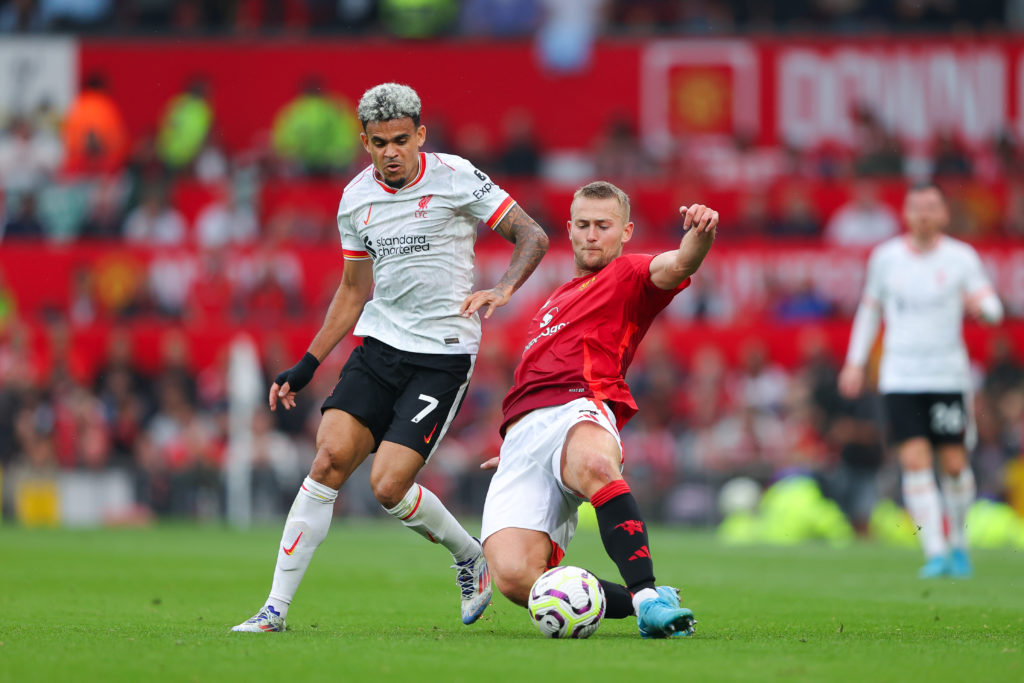 Luis Diaz of Liverpool battles for possession with Matthijs de Ligt of Manchester United during the Premier League match between Manchester United ...