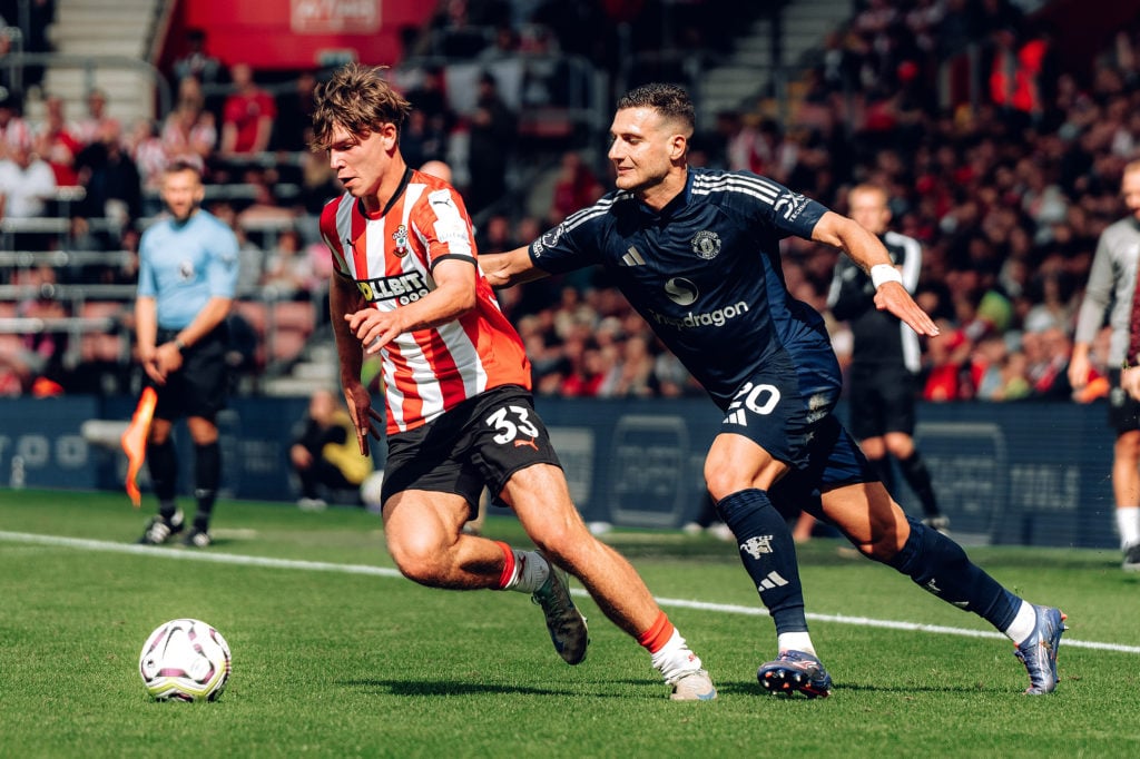 Diogo Dalot of Manchester United in action with Tyler Dibling of Southampton during the Premier League match between Southampton FC and Manchester ...