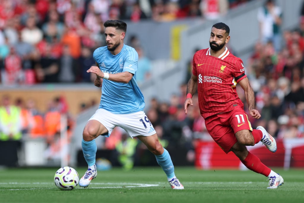 Alex Moreno of  Nottingham Forest beats Mohamed Salah of Liverpool during the Premier League match between Liverpool FC and Nottingham Forest FC at...