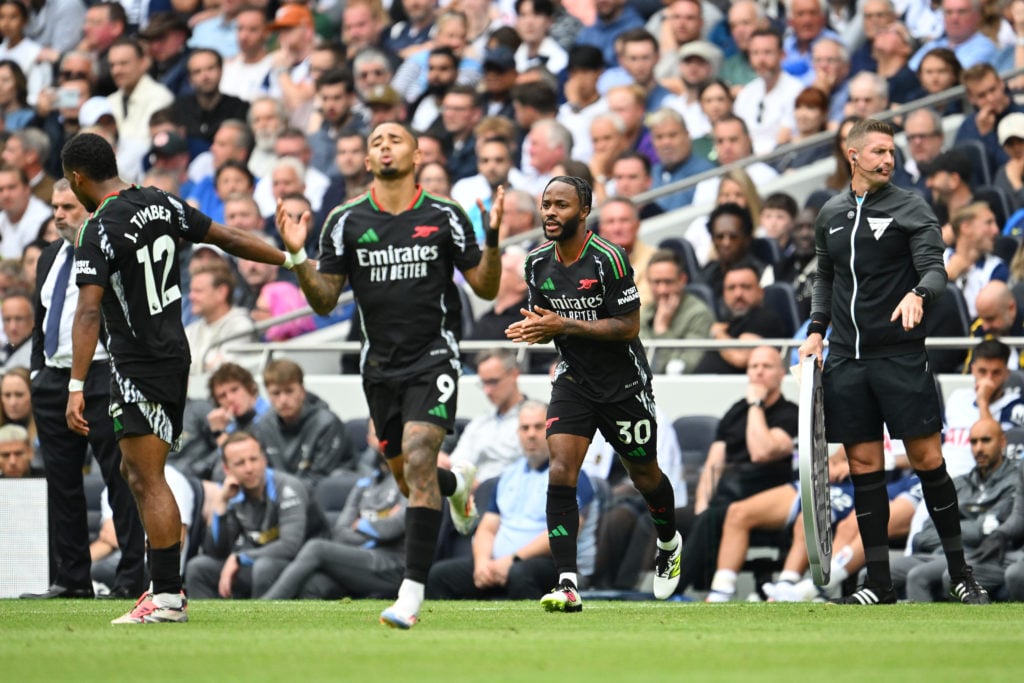 Raheem Sterling of Arsenal enters the pitch to make his debut during the Premier League match between Tottenham Hotspur FC and Arsenal FC at Totten...