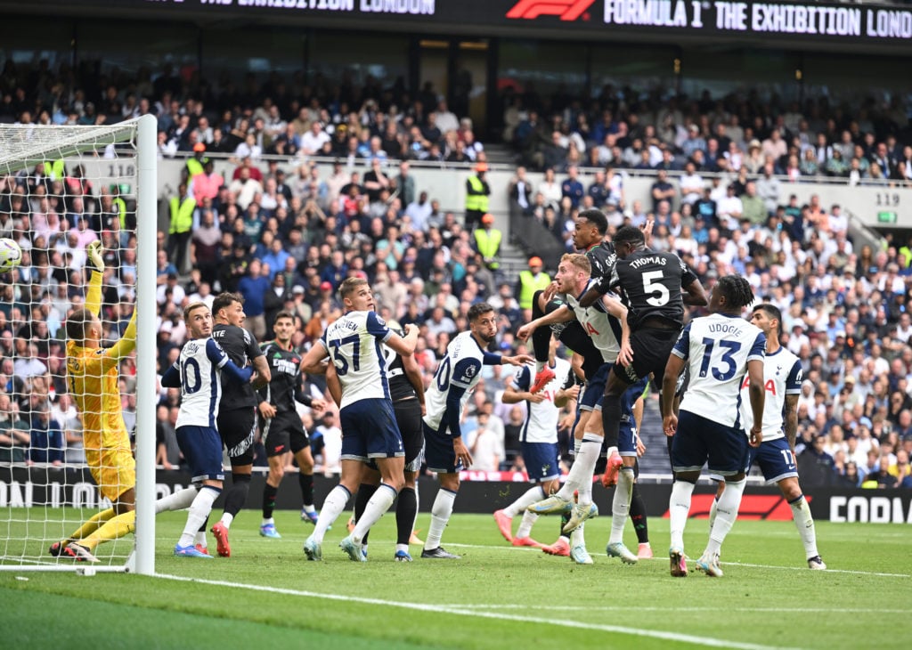 Gabriel heads past Tottenham goalkeeper Guglielmo Vicario to score the Arsenal goal during the Premier League match between Tottenham Hotspur FC an...