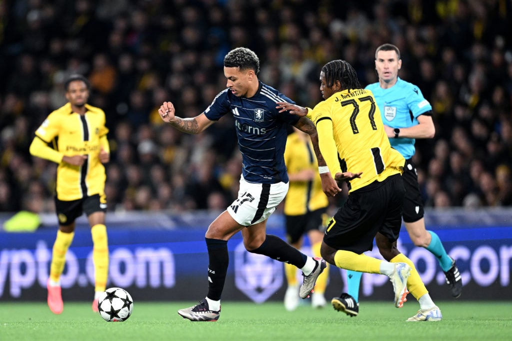 Morgan Rogers of Aston Villa is challenged by Joel Monteiro of BSC Young Boys during the UEFA Champions League 2024/25 League Phase MD1 match betwe...