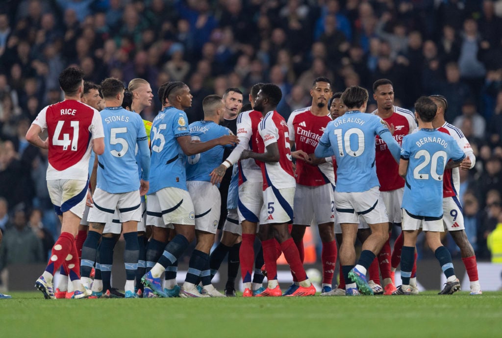 Arsenal and Manchester City teams confront each other during the Premier League match between Manchester City FC and Arsenal FC at Etihad Stadium o...