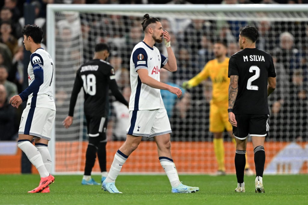 Radu Dragusin of Tottenham Hotspur reacts, while leaving the pitch after receiving a red card during the UEFA Europa League 2024/25 League Phase MD...