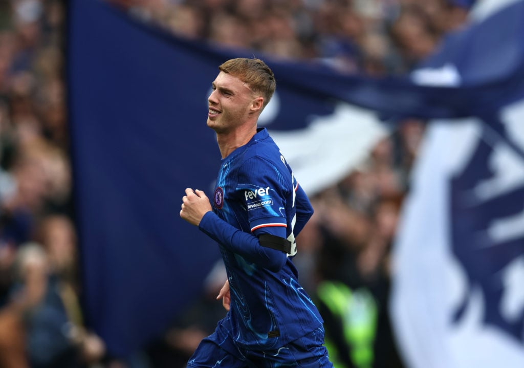 Cole Palmer of Chelsea celebrates scoring his team's third goal and his hat trick during the Premier League match between Chelsea FC and Brighton &...