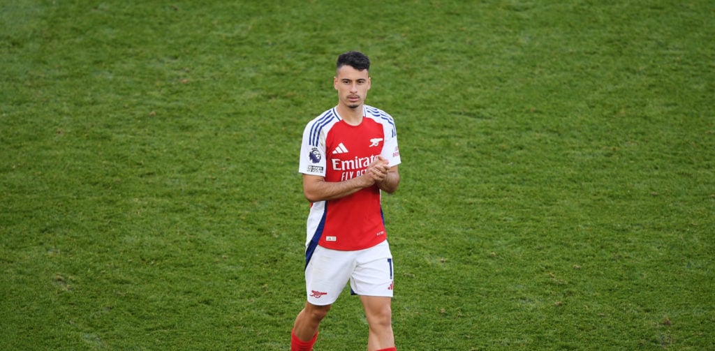 Gabriel Martinelli of Arsenal applauds fans after the Premier League match between Arsenal FC and Leicester City FC at Emirates Stadium on Septembe...