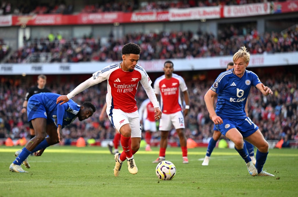 Ethan Nwaneri of Arsenal rtakes on Victor Kristiansen of Leicester City during the Premier League match between Arsenal FC and Leicester City FC at...