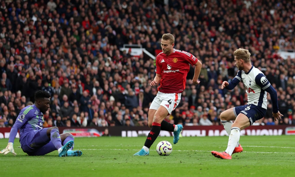 Timo Werner of Tottenham Hotspur shoots under pressure from Matthijs de Ligt of Manchester United during the Premier League match between Mancheste...