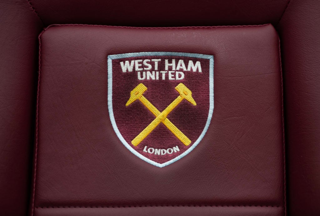 The West Ham crest is seen on the manager's seat prior to the Premier League match between West Ham United and Southampton FC at London Stadium on ...