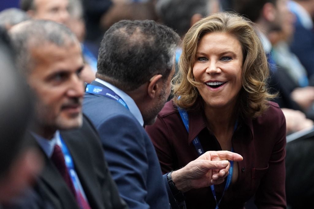 Newcastle United's English minority owner Amanda Staveley (R) attends a panel discussion during the Global Investment Summit at Hampton Court Palac...