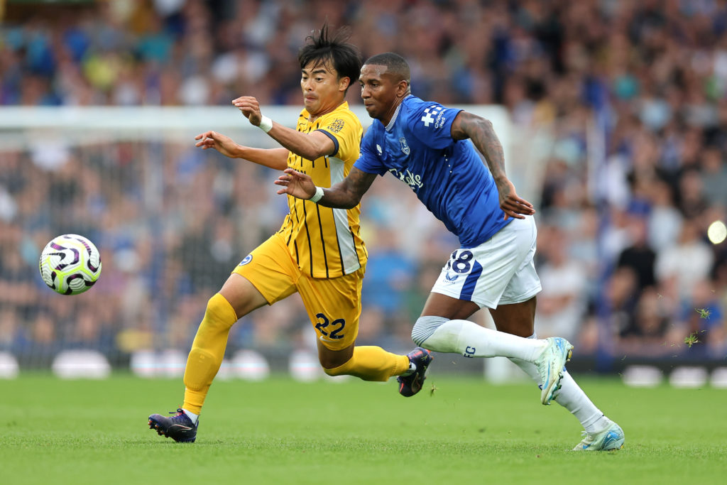 Kaoru Mitoma of Brighton & Hove Albion is fouled by Ashley Young of Everton during the Premier League match between Everton FC and Brighton &am...