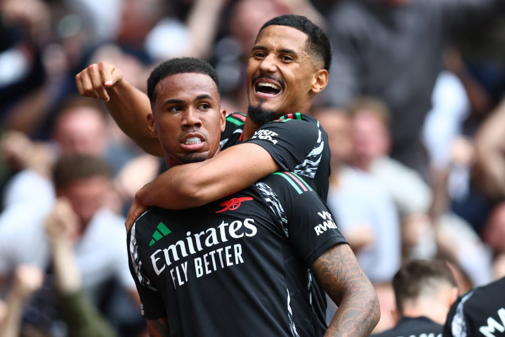 William Saliba of Arsenal celebrates with winning goal scorer Gabriel during the Premier League match between Tottenham Hotspur FC and Arsenal FC a...