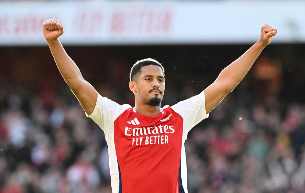 William Saliba of Arsenal celebrates at full-time following the team's victory in the Premier League match between Arsenal FC and Leicester City FC...