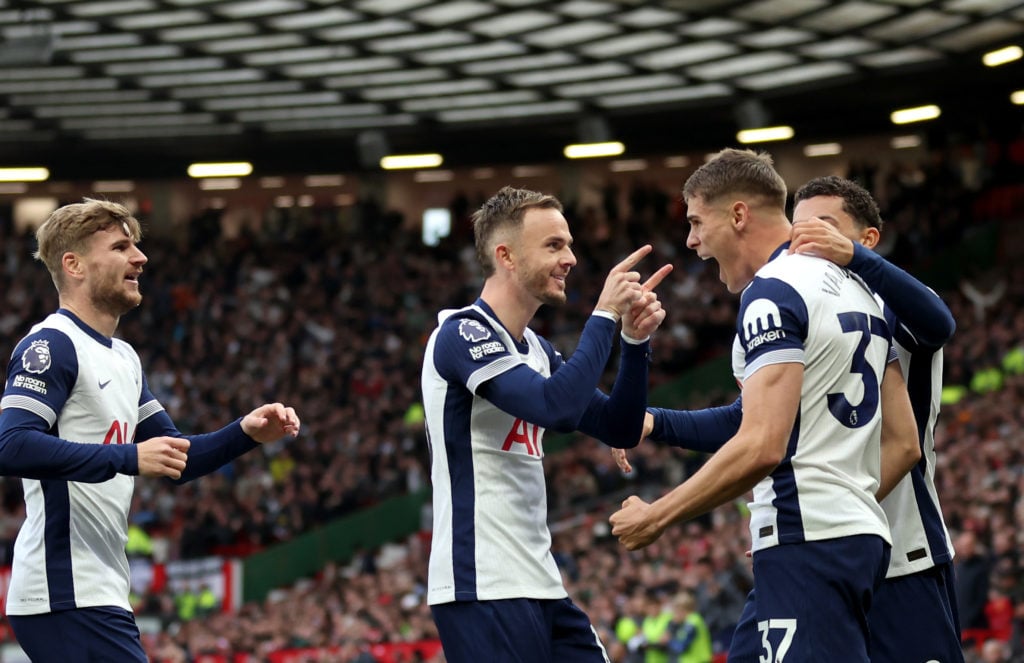 Brennan Johnson of Tottenham Hotspur celebrates scoring his team's first goal with teammates Micky van de Ven and James Maddison during the Premier...