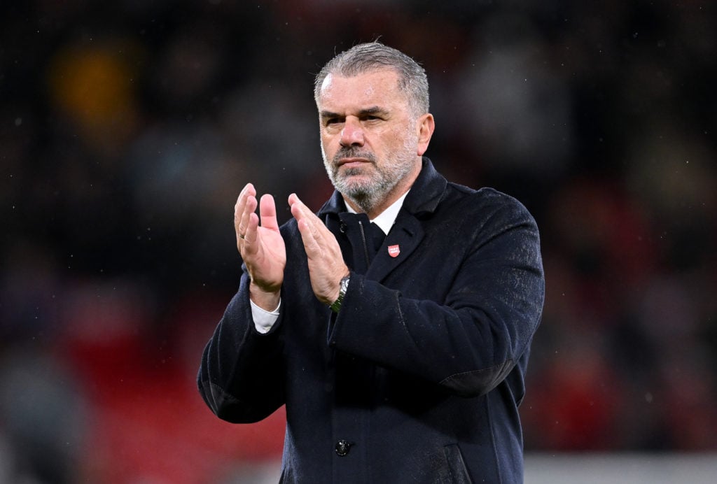 Ange Postecoglou, Manager of Tottenham Hotspur, acknowlegdes the fans after the Premier League match between Manchester United FC and Tottenham Hot...