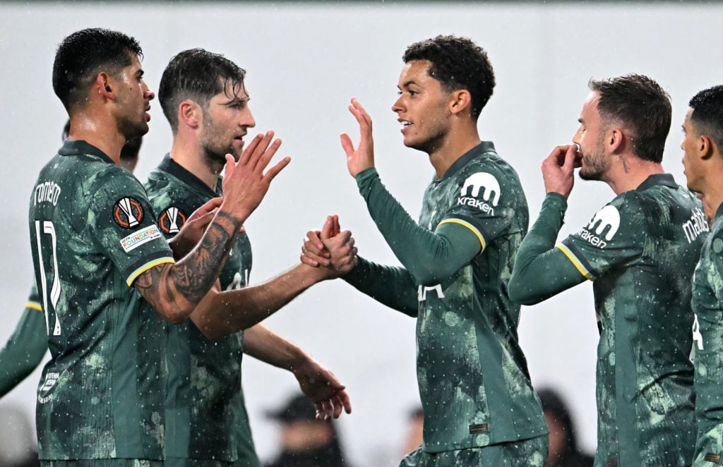 Tottenham Hotspur's Welsh striker #22 Brennan Johnson (C) celebrates with teammates after scoring the 2-0 goal during the UEFA Europa League footba...