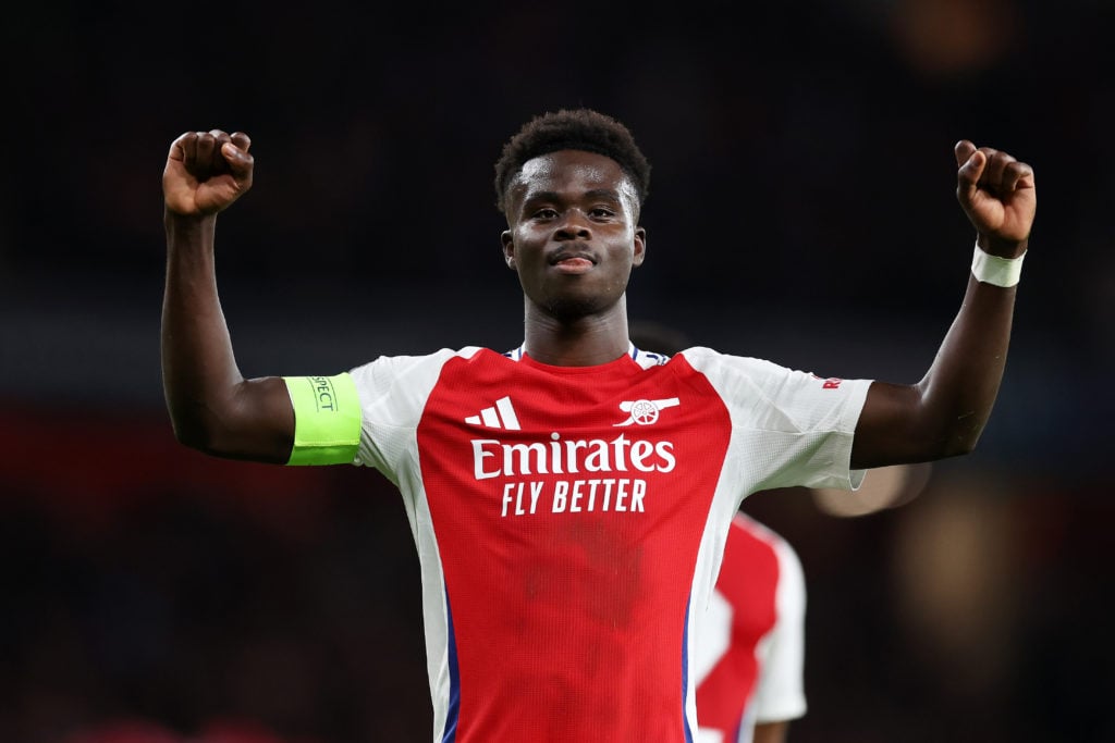 Bukayo Saka of Arsenal celebrates scoring his team's second goal during the UEFA Champions League 2024/25 League Phase MD2 match between Arsenal FC...