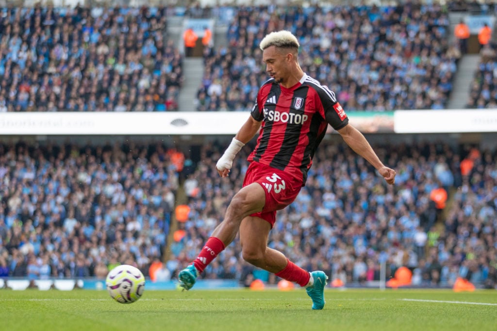 Antonee Robinson #33 of Fulham FC is in action during the Premier League match between Manchester City and Fulham at the Etihad Stadium in Manchest...