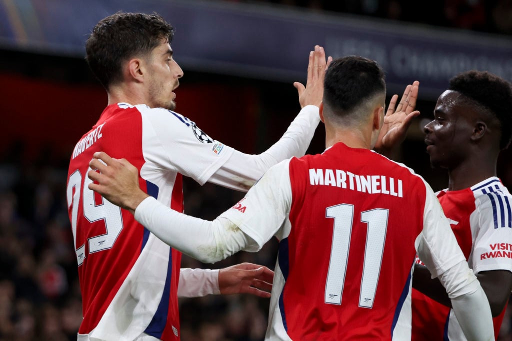 Kai Havertz of Arsenal celebrates his goal with Bukayo Saka during the UEFA Champions League 2024/25 League Phase MD2 match between Arsenal FC and ...