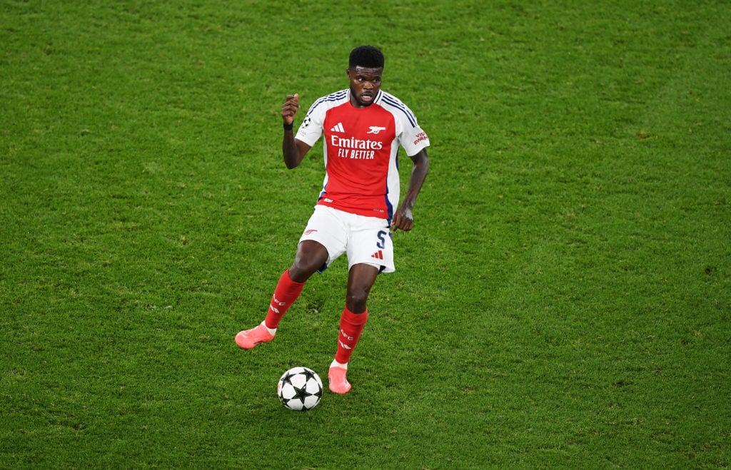 Thomas Partey of Arsenal passes the ball during the UEFA Champions League 2024/25 League Phase MD2 match between Arsenal FC and Paris Saint-Germain...