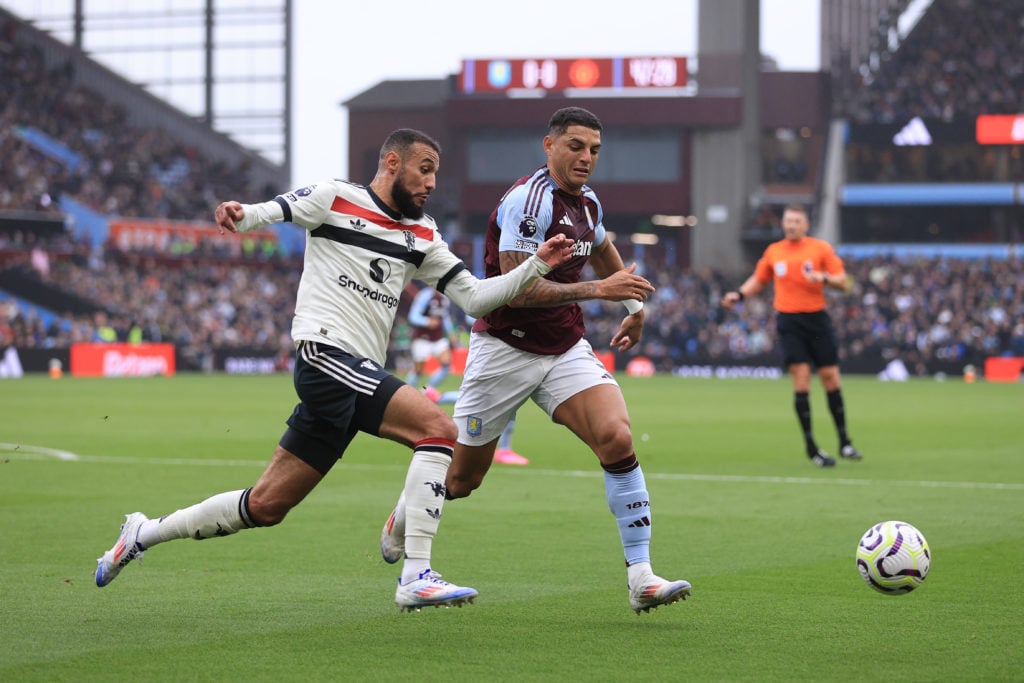 Noussair Mazraoui of Manchester United battles with Diego Carlos of Aston Villa during the Premier League match between Aston Villa FC and Manchest...