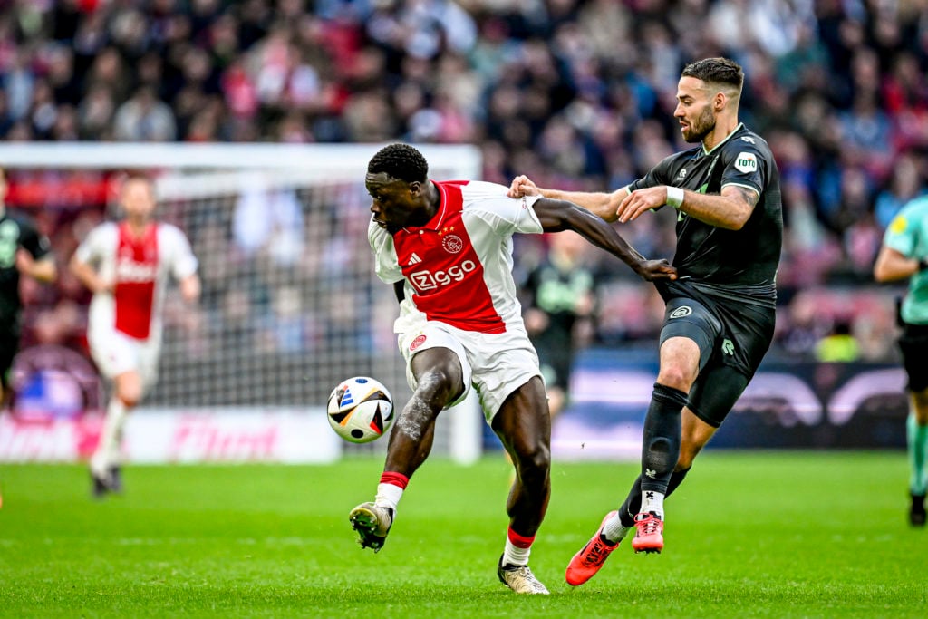 AFC Ajax Amsterdam forward Brian Brobbey and FC Groningen defender Marco Rente play during the match between Ajax and Groningen at the Johan Cruijf...