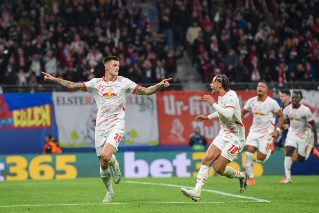 Benjamin Sesko of RB Leipzig celebrates with teammates after scoring his team's second goal during the UEFA Champions League 2024/25 League Phase M...