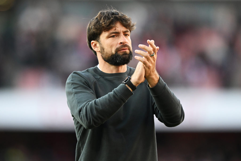 Russell Martin, Manager of Southampton, acknowledges the fans after the Premier League match between Arsenal FC and Southampton FC at Emirates Stad...