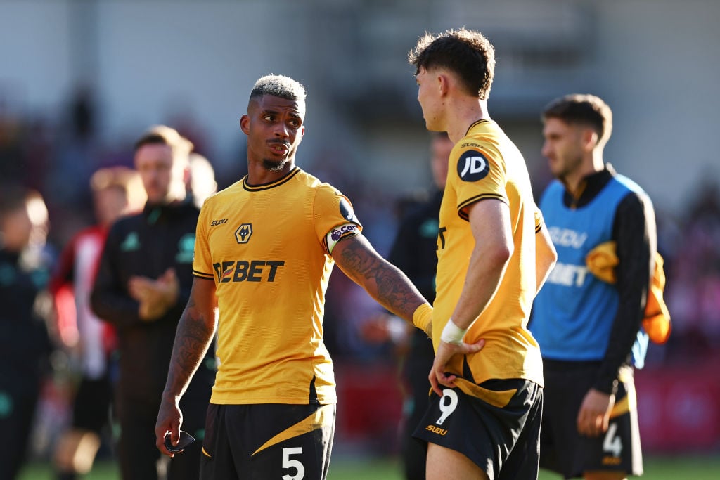 Mario Lemina and Joergen Strand Larsen of Wolverhampton Wanderers interact following the Premier League match between Brentford FC and Wolverhampto...