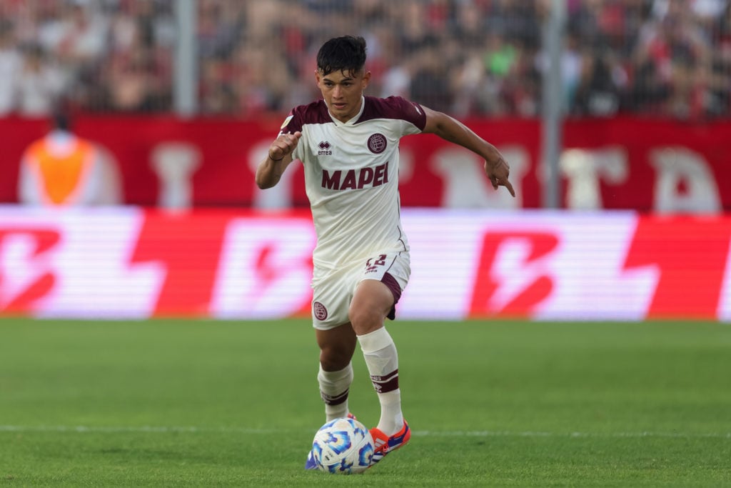 Julio Soler of Lanús runs with the ballduring the Liga Profesional 2024 match between Newell's Old Boys and Lanús at Estadio Marcelo Bielsa on Octo...