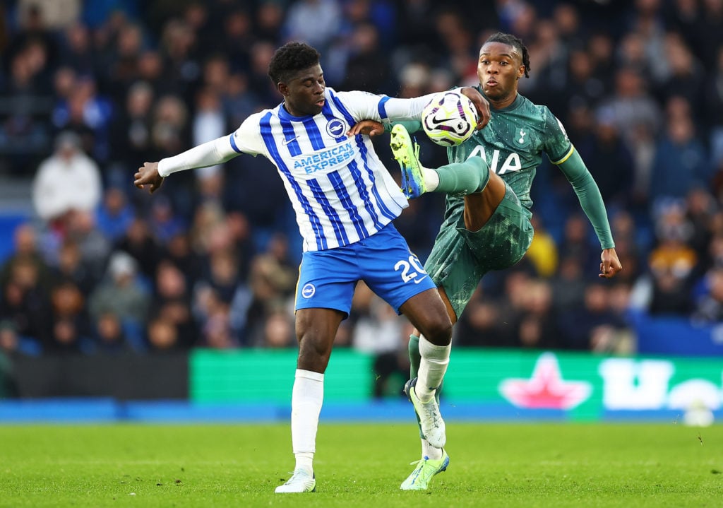 Carlos Baleba of Brighton & Hove Albion battles for possession with Destiny Udogie of Tottenham Hotspur during the Premier League match between...