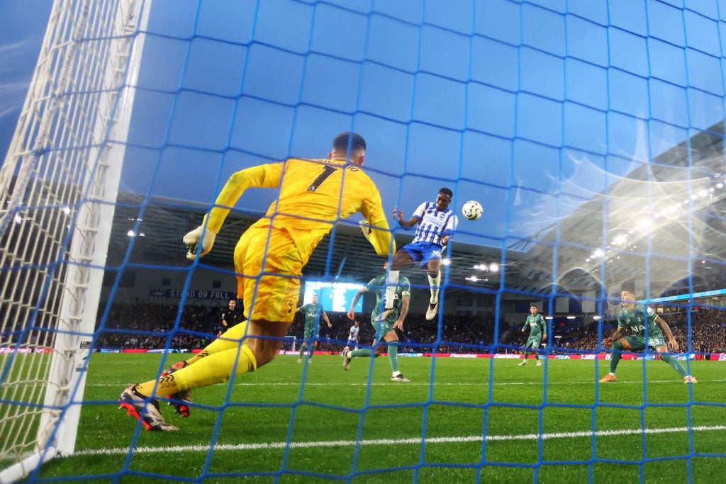 Danny Welbeck of Brighton & Hove Albion scores his team's third goal past Guglielmo Vicario of Tottenham Hotspur during the Premier League matc...