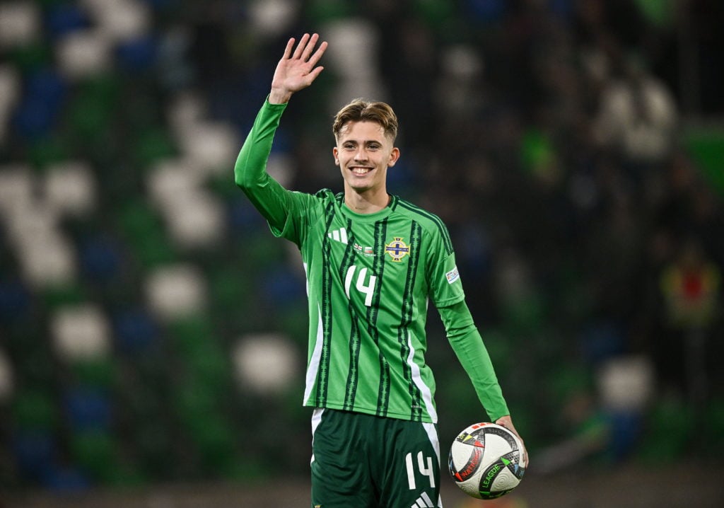 Belfast , United Kingdom - 15 October 2024; Isaac Price of Northern Ireland with the match ball after he scored a hat trick during the UEFA Nations...