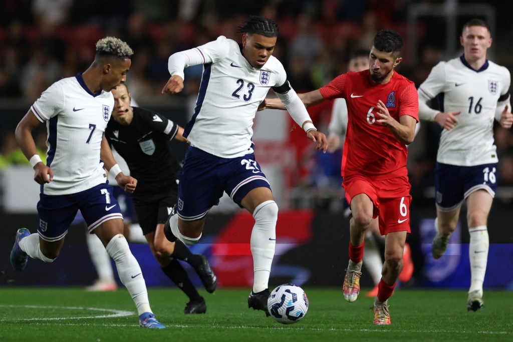 Dane Scarlett of England  runs past the challenge of Zeynaddin Abdurahmanov of Azerbaijan looks on during the UEFA U21 Euro 2025 Qualifier Group Si...