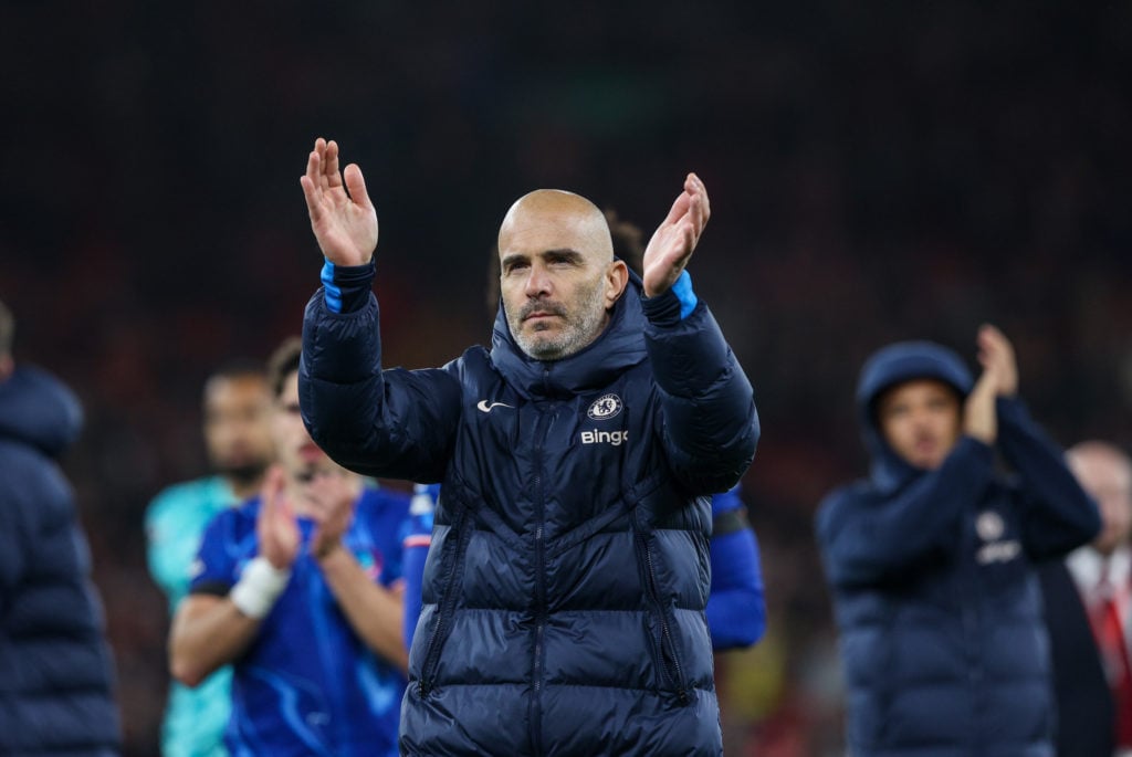 Chelsea manager Enzo Maresca applauds the fans at the final whistle of the Premier League match between Liverpool FC and Chelsea FC at Anfield on O...