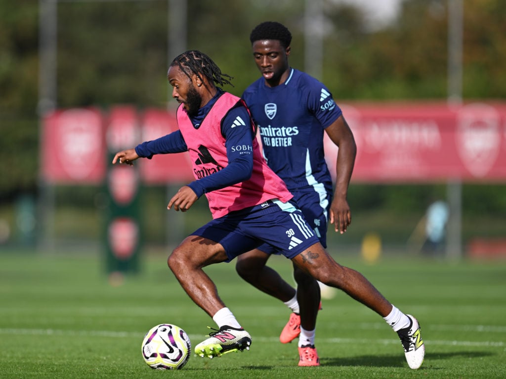 (L-R) Raheem Sterling and Ismeal Kabia of Arsenal during a training session at Sobha Realty Training Centre on October 18, 2024 in London Colney, E...