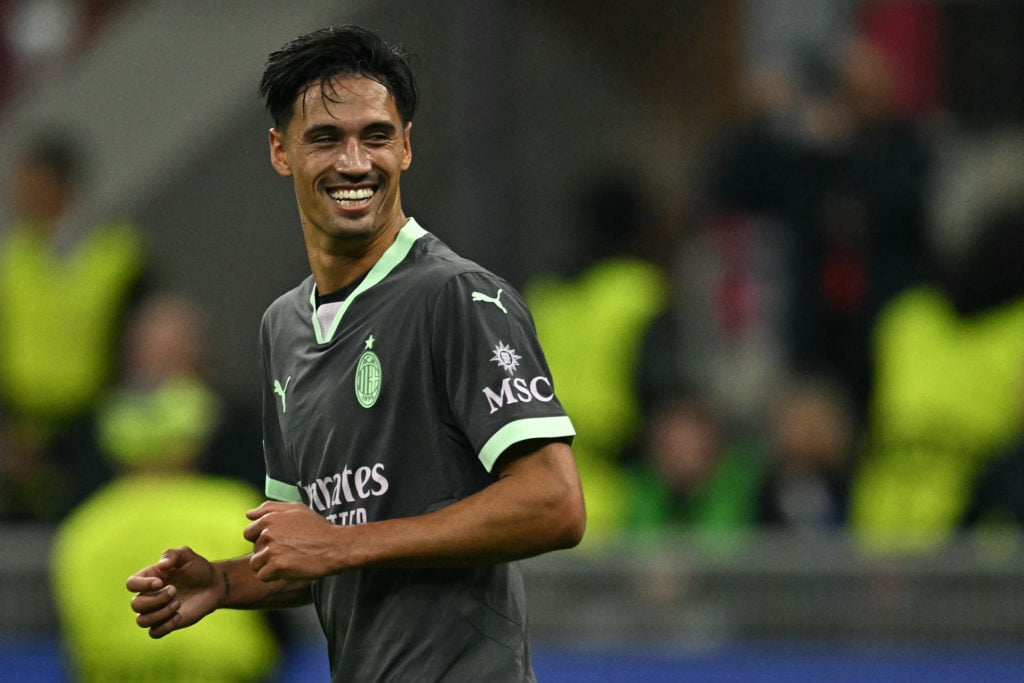 AC Milan's Dutch midfielder #14 Tijani Reijnders celebrates scoring his team's third goal during the Champions League football match between AC Mil...