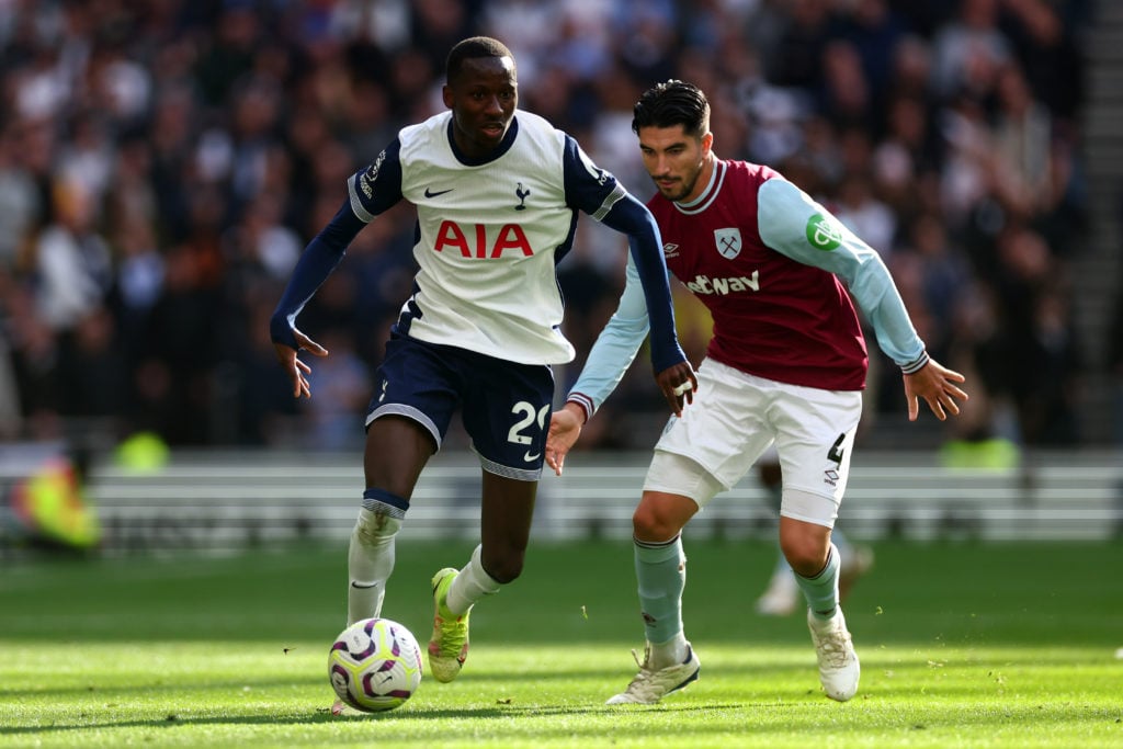 Carlos Soler of West Ham United in action with Pape Matar Sarr of Tottenham Hotspur during the Premier League match between Tottenham Hotspur FC an...