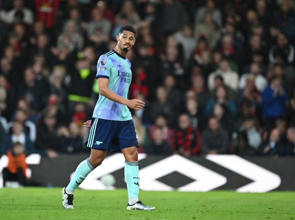 William Saliba of Arsenal leaves the field after being shown a red card during the Premier League match between AFC Bournemouth and Arsenal FC at V...