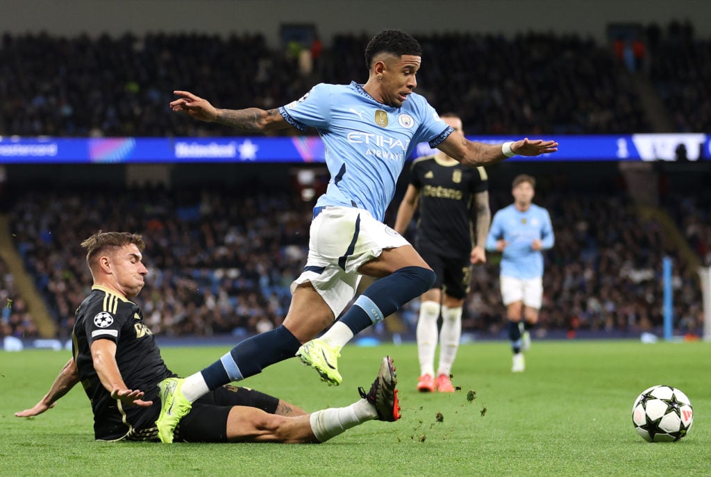 Savio of Manchester City is challenged by Matej Rynes of AC Sparta Praha during the UEFA Champions League 2024/25 League Phase MD3 match between Ma...