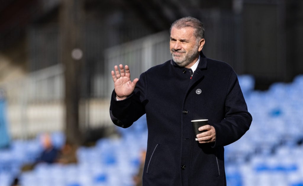 Tottenham Hotspur's manager Ange Postecoglou inspecting the pitch before the match during the Premier League match between Crystal Palace FC and To...