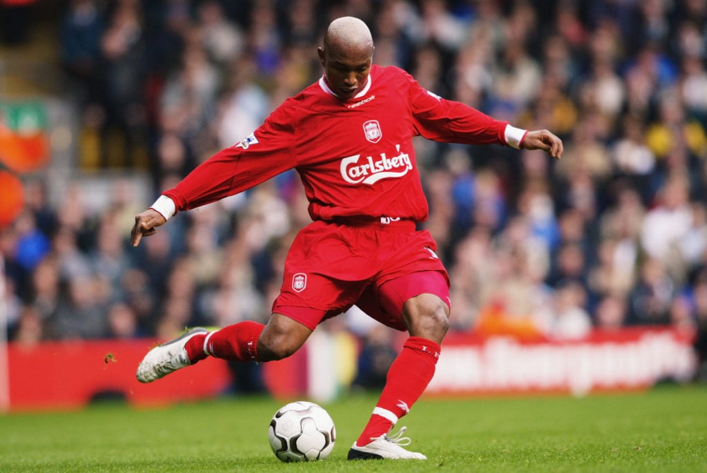 El Hadji Diouf of Liverpool strikes the ball during the FA Barclaycard Premiership match between Liverpool and Leeds on October 25, 2003 at Anfield...