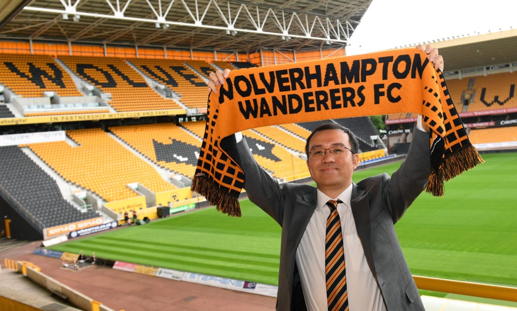 Jeff Shi, representative of the Fosun group, poses ahead of the unveiling of the new Wolverhampton Wanderers club owners at Molineux on July 25, 20...