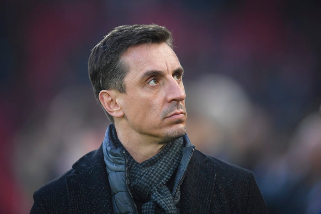 Sky Sports pundit Gary Neville looks on during the Premier League match between Liverpool FC and Manchester United at Anfield on January 19, 2020 i...