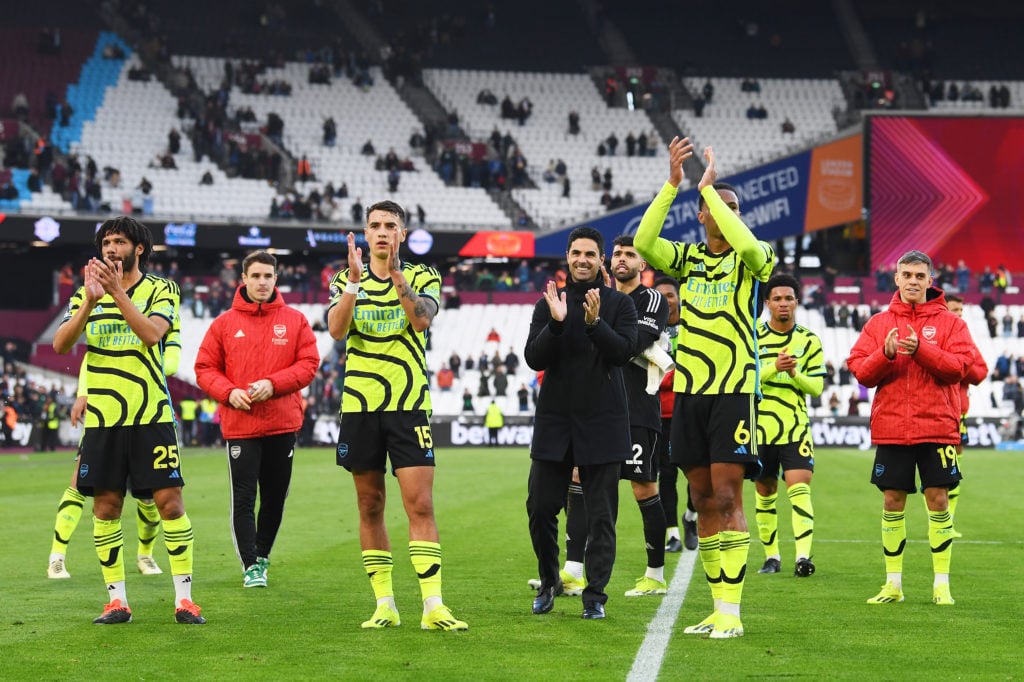 Mohamed Elneny, Jakub Kiwior, Mikel Arteta and Gabriel of Arsenal applaud the fans after the team's victory during the Premier League match between...