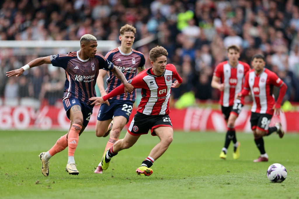 James McAtee of Sheffield United runs with the ball whilst under pressure from Danilo of Nottingham Forest during the Premier League match between ...