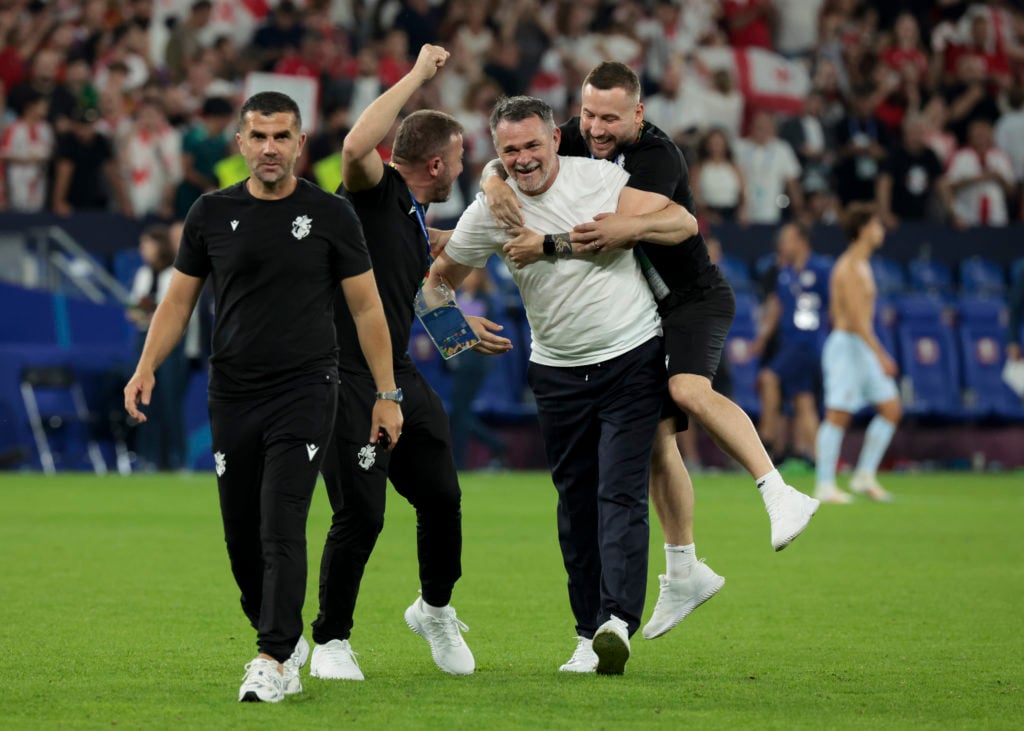 Assistant-coach of Gerogia Adel Chedli,, coach Willy Sagnol and assistant-coach David Webb celebrate the victory following the UEFA EURO 2024 group...