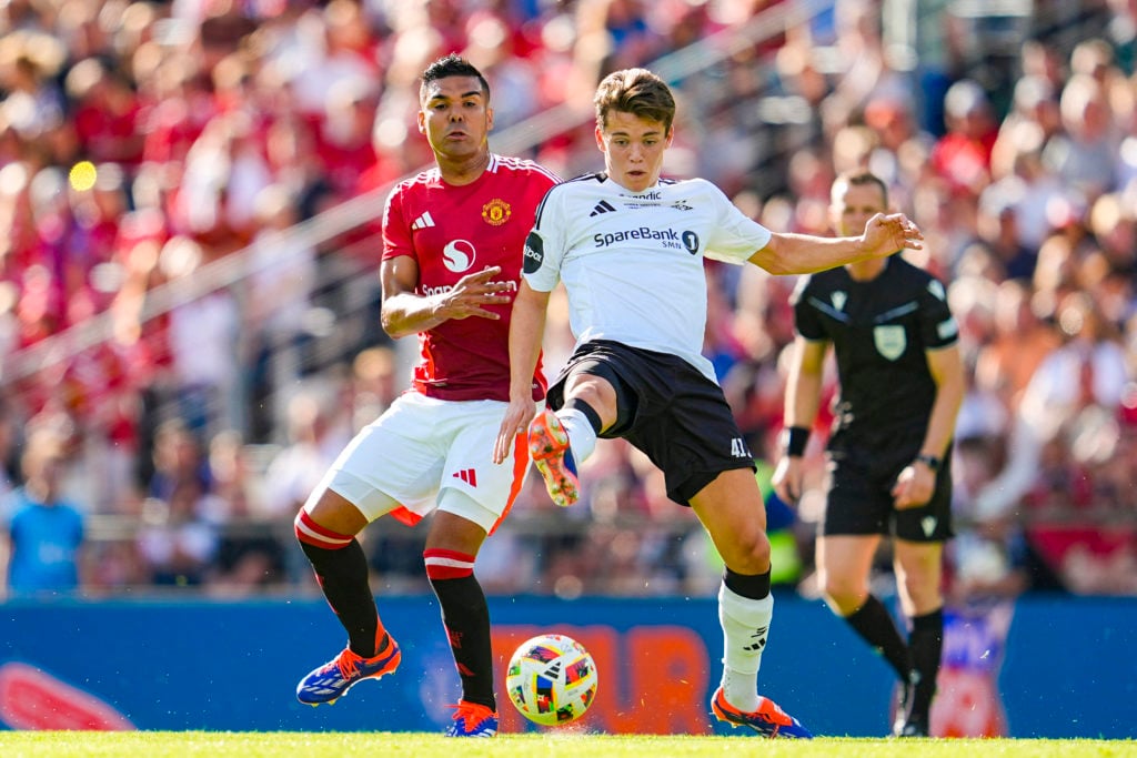 Manchester United's Brazilian midfielder #18 Casemiro (L) and Rosenborg's Norwegian midfielder #41 midfielder Sverre Nypan vie for the ball during ...